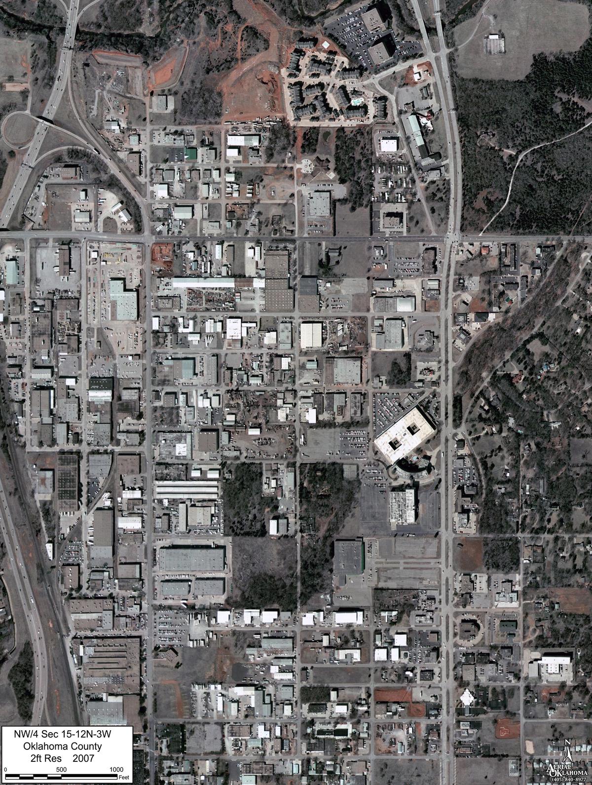 2007: the first color frame, apartment complexes across the north and red dirt where the next ones are graded
